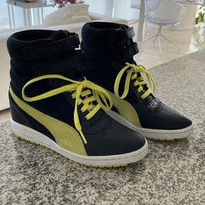Puma, 7, yellow and black platform heeled boots